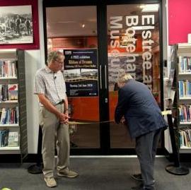 Dave & Noel cut ribbon